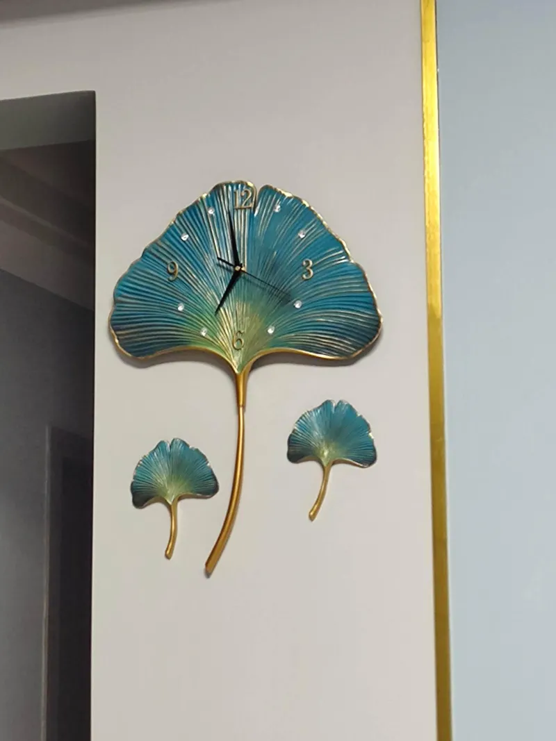 The Gilded Nest Wohndeko-Blatt-Wanduhr – Elegantes, stilles Dekor