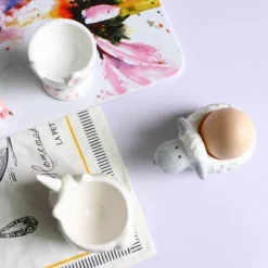 The Decor Haven Küche & Esszimmer-Eierhalter-Set aus Keramik – süße Frühstückshalter in Tierform, 2 Stück