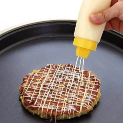 Tom Küche & Esszimmer-4-Loch-Quetschsaucenflasche zum Dekorieren von Ketchup, Cremes und Kuchen