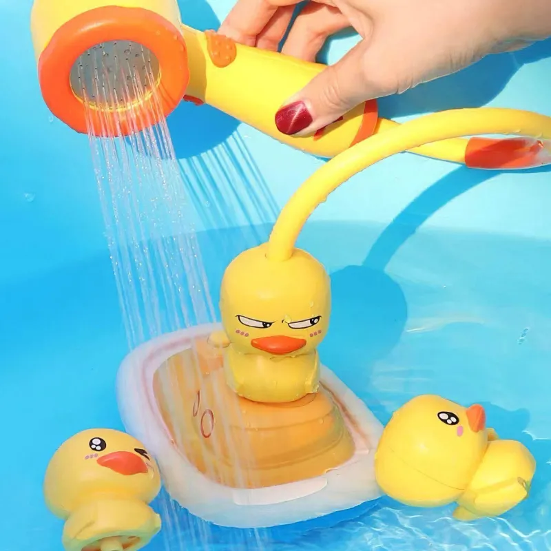 The Decor Haven Babyspielzeug-Schwimmendes Sprinkler-Badespielzeug in Entenform – lustiges Wasserspiel für Kinder