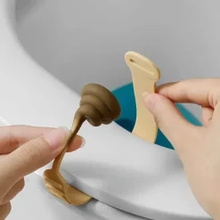 The Blissful Bath Badezimmer-Silicone Toilet Lid Lifter - Fun Poop Shaped Tool