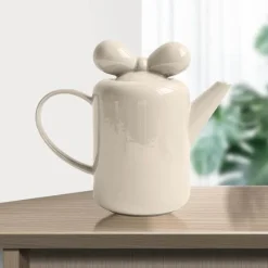 The Cozy Mug Küche & Esszimmer-Teekanne aus Porzellan mit Schleifenknoten-Design – Elegante Teekanne aus Keramik
